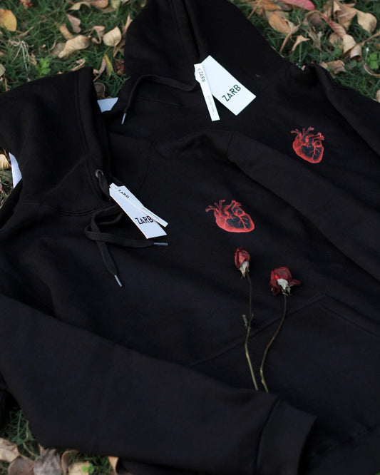 Packung mit Paar-Kapuzenpullovern