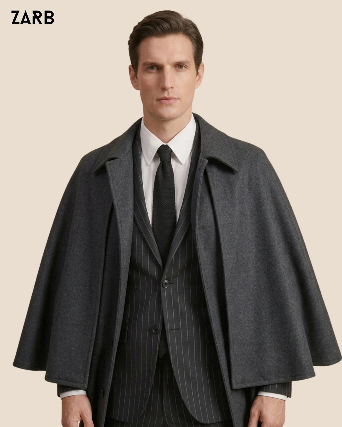 Charcoal grey shoulder cape detail on men's traditional sleeveless Inverness coat