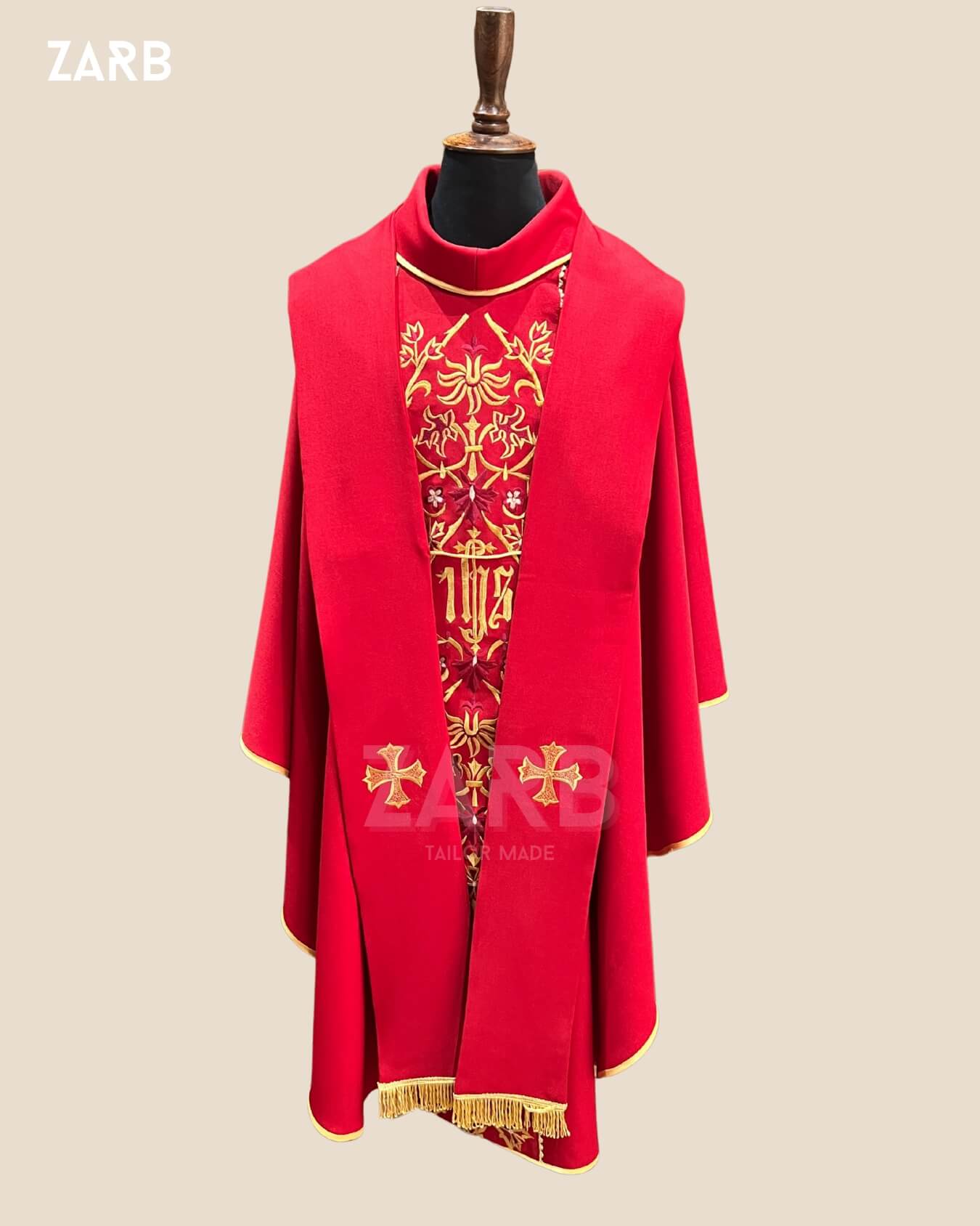 Custom red IHS embroidered chasuble for Pentecost and martyrs detailed gold thread close up