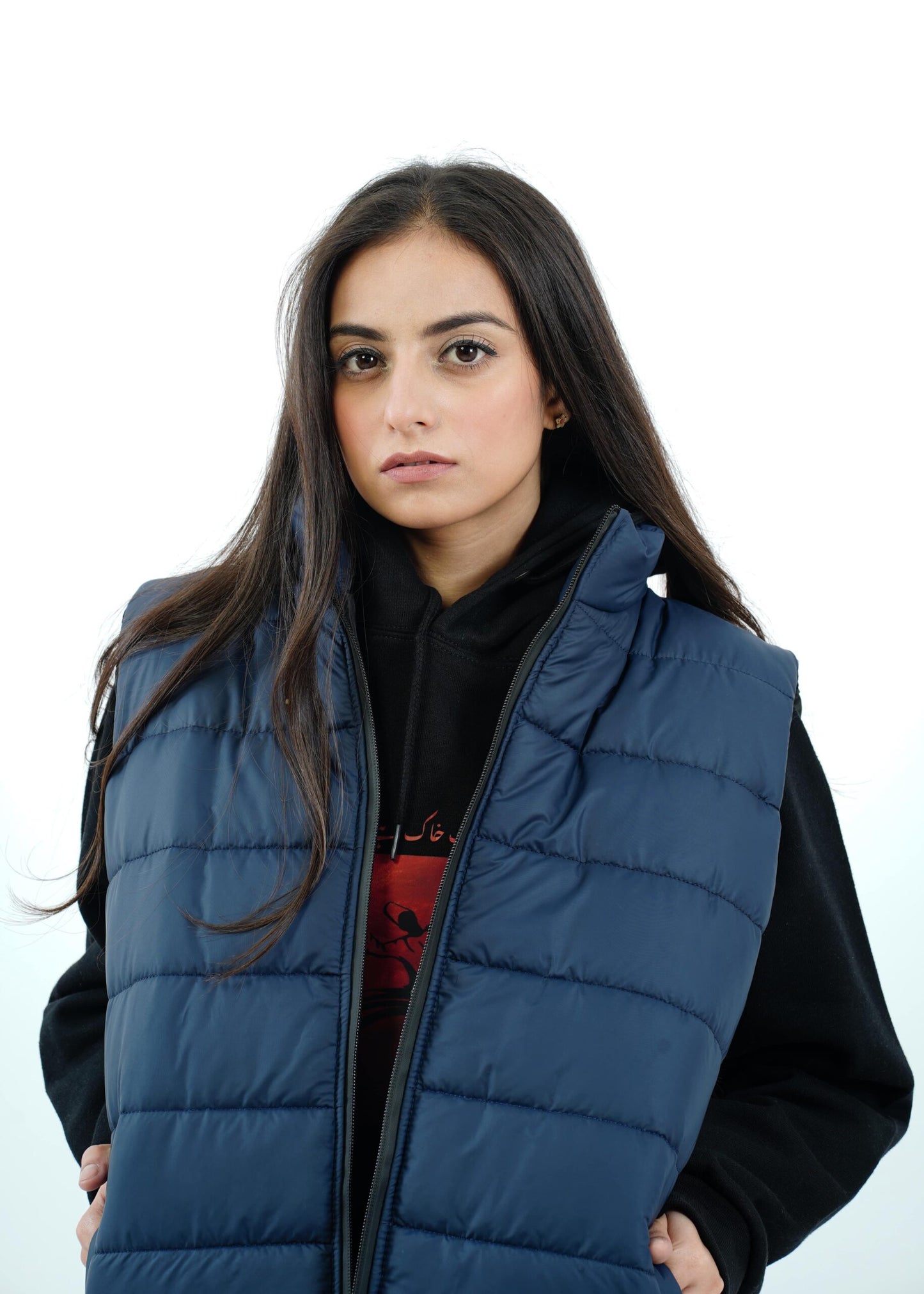 Blue sleeveless puffer jacket