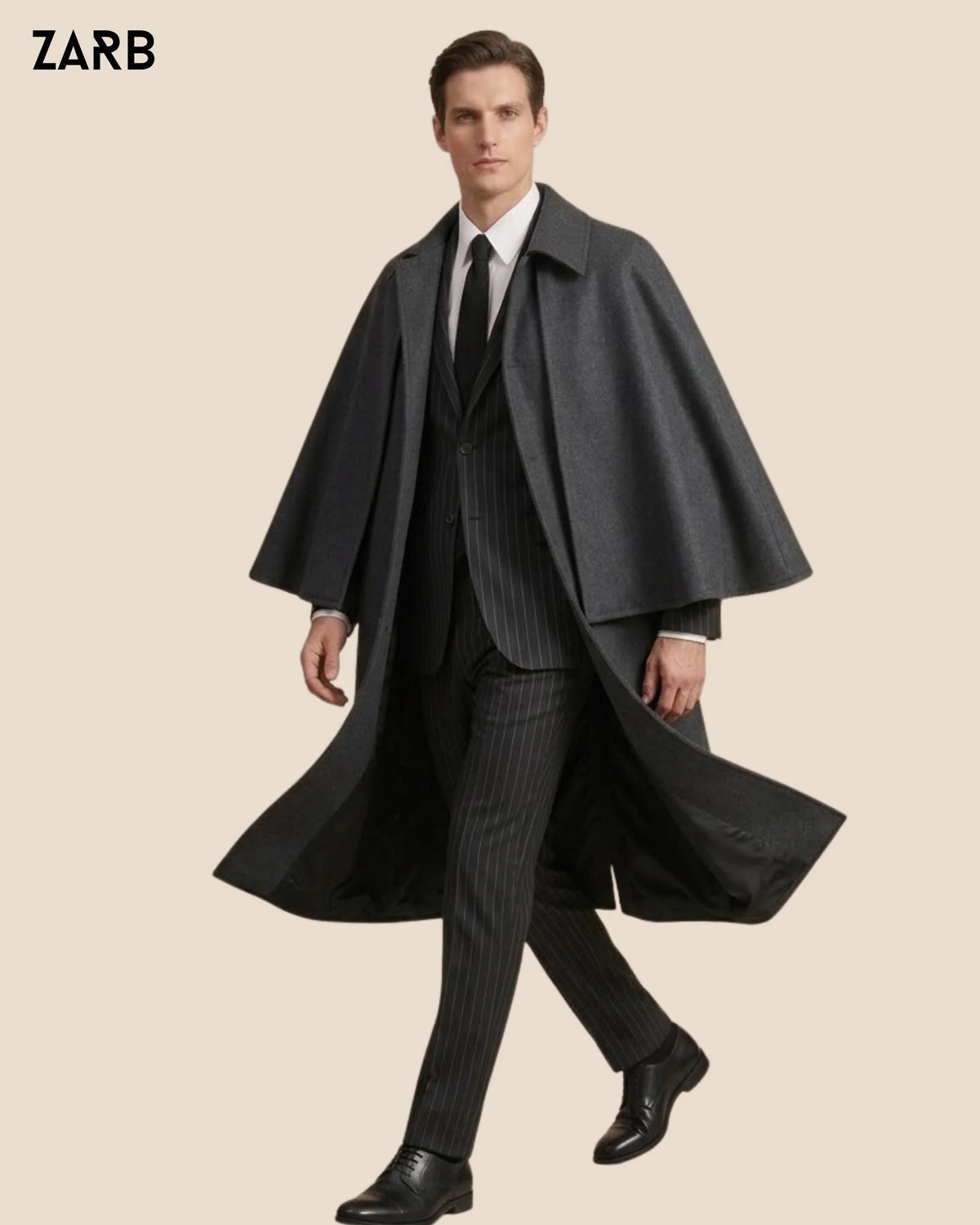 Three quarter view of charcoal grey sleeveless Victorian Inverness cape coat for men